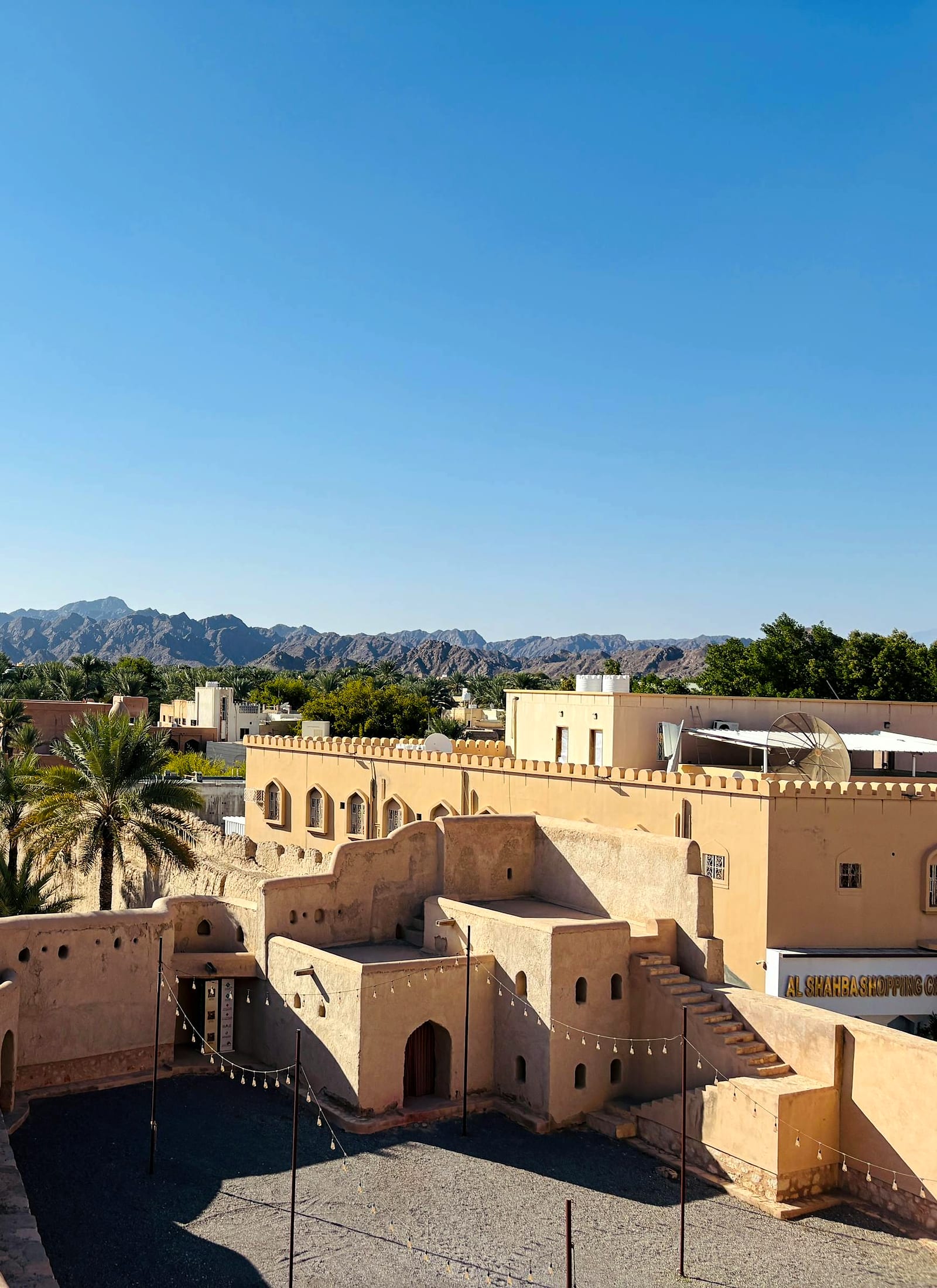 Mud-brick town of Nizwa nestled in palm groves