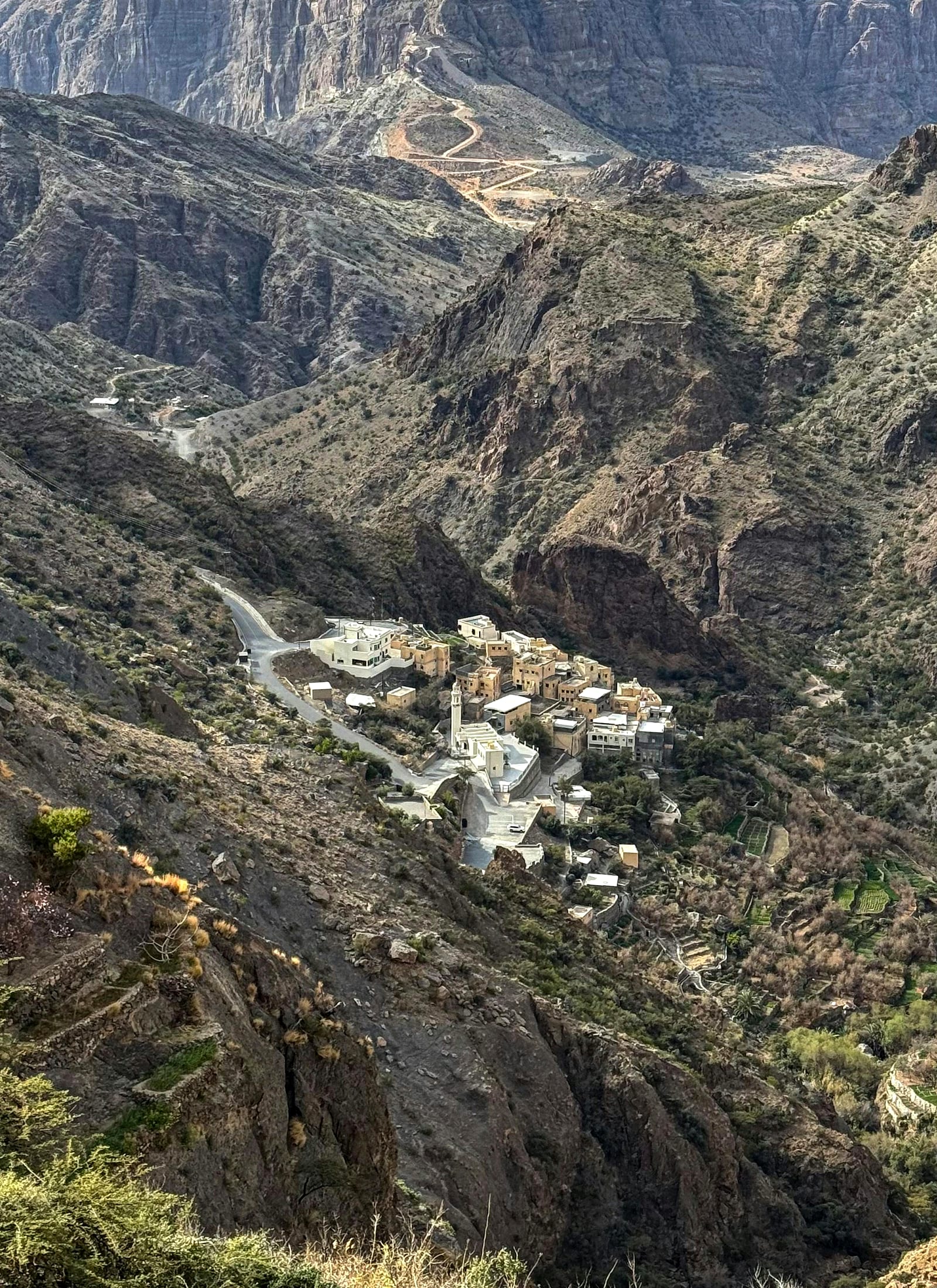 Jebel Misht's dramatic peak rising over the Hajar mountains